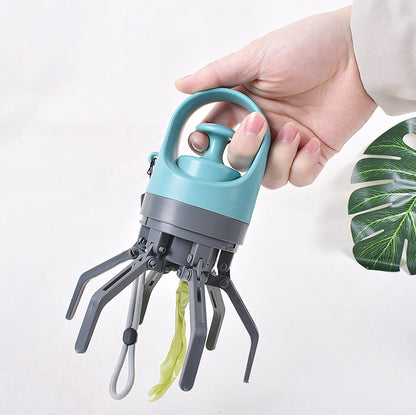 Hand holding a blue and gray tool with plant material on a white background